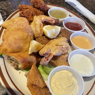 Sampler Plate -meat Louisiana Spicy Fried Pies -fried shrimp -boudin balls -egg rolls