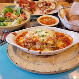 Lasagna, salad, garlic bread,