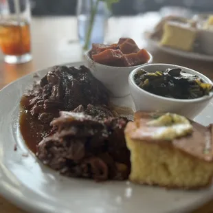 Brisket Basket with 2 sides. Greens and Sweet Potatoes.