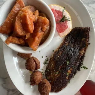Blackened Catfish, perfectly seasoned sweet potatoes &amp; delicious hush puppies!