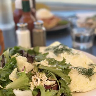Egg White Greek Omelet with side salad. Super fresh house made dressing.