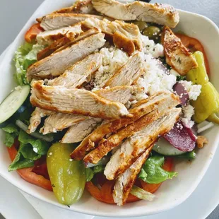 Small Greek salad with chicken.