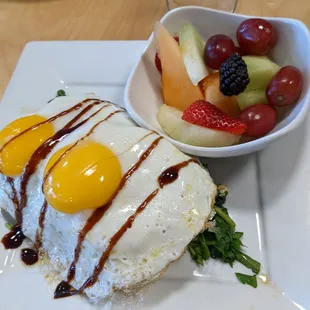 Avocado toast and fresh fruit - top pre-cut view