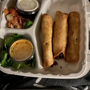 Chicken taquitos served with sour cream, pico de gallo, and queso