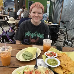 Fish tacos, Pablano vegan burrito, and chips and guacamole