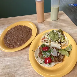 Awesome tortillas, wonderful carnitas, but the veggie was meh.