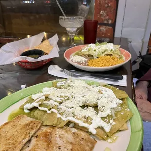 Chicken chilaquiles and chicken enchiladas.