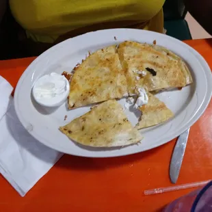 a plate of quesadillas