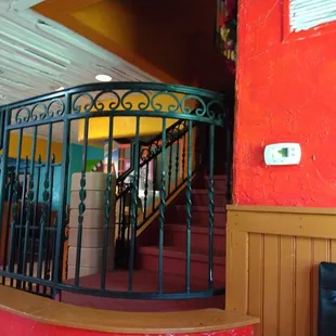 a staircase leading to the dining room