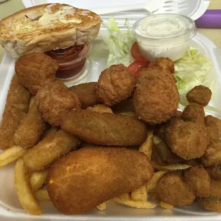 Veggie plate: fried stuffed jalapeños, okra, mushrooms, and cheese sticks served with French fries, salad, &amp; toast.