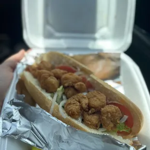 Cajun shrimp poboy with onions