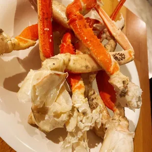 a plate of crab legs and crab legs