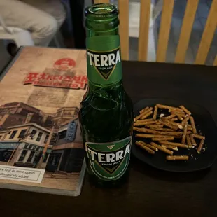 Beer served with pretzels.