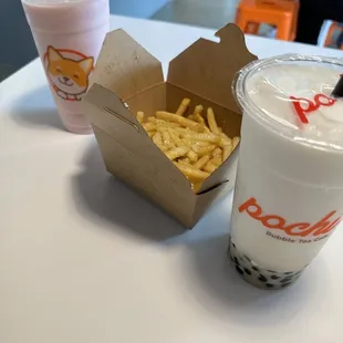 Strawberry coconut creamy shake, garlic fries, lychee creamy shake with boba (left to right)