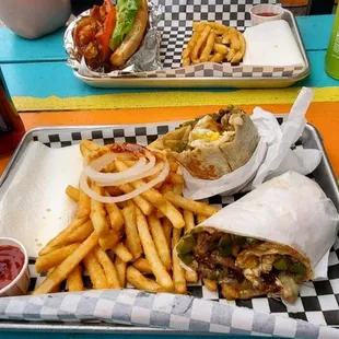 TriTip Burrito with egg request, and a Mexican coke, Chicken Satay on a French roll with Lime Jarritos