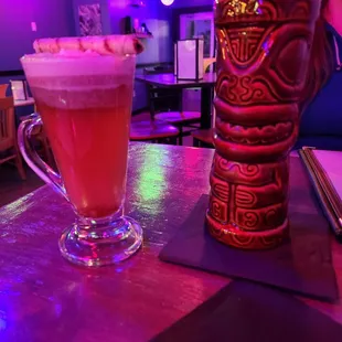 To the let, a hot buttered rum that warm you so well. With the their chai rum to spice it up. So good. Would get again.