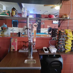 a bar with a beer tap