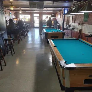 a pool table and bar