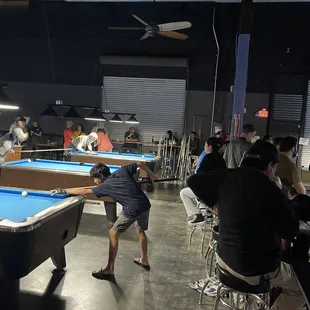 people playing pool