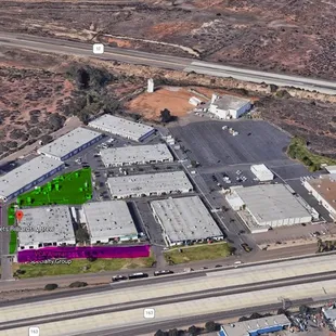 Tesla will ticket or tow you.   Thus, it is recommended to park in the green highlighted area.