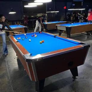 people playing pool