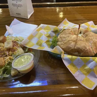 Croissant sandwich with side salad