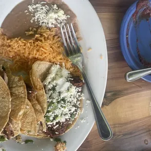 Steak taco with rice and beans