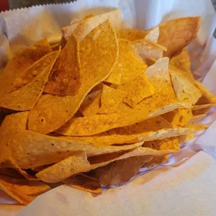 Chips. The salsa was running liquid in a squirt bottle. They automatically bring this to you and then charge you for it.