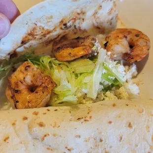 Shrimp taco. Skimpy with only three pieces of shrimp for a $6 taco.