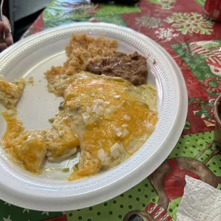 Green cheese enchilada plate.rice,beans and their red salsa that is served with their chips.