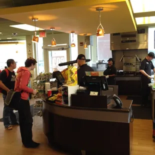 a group of people preparing food