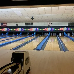 a bowling alley with bowling balls