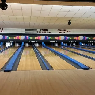 a bowling alley with bowling balls