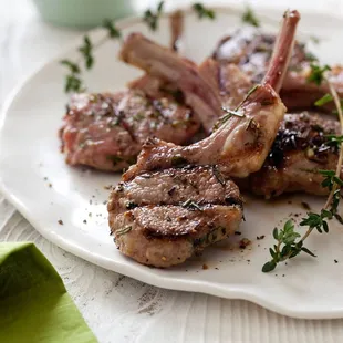 a plate of lamb chops
