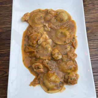 Bottoni di melanzana e gamberi