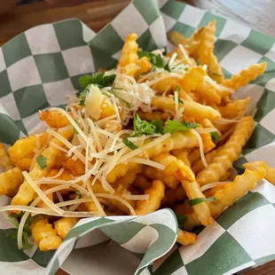 a basket of cheese fries