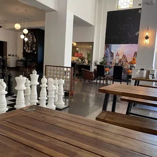 a large chess set in a restaurant