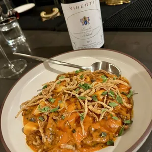 Gnocchi braised lamb, tomato butter, fried herbs