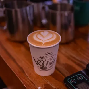 a cup of coffee on a table