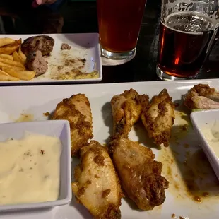 Chicken wings and meatballs. Yum