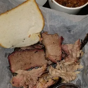 Brisket and pulled pork with jambalaya and baked beans