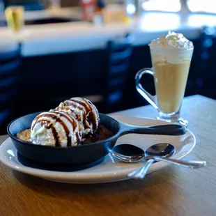 a bowl of ice cream and a cup of coffee
