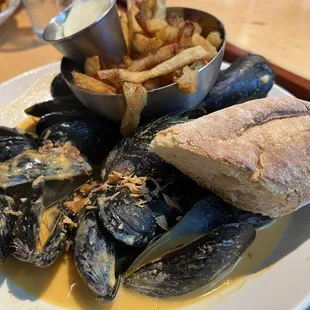 Mussels Moules Frites Dinner with red curry