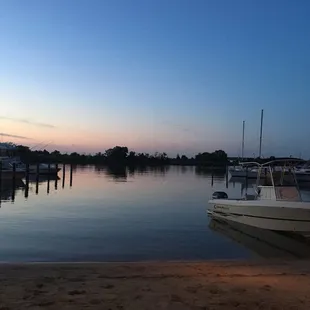 a boat docked on the beach
