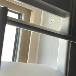 Shutter installer damaged wall