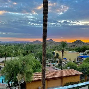 Overlooking pool area from room at sunset