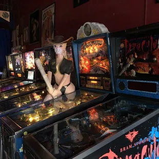 a row of pinball machines