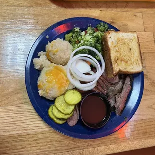 2 meat with brisket sausage potato casserole and broccoli salad with Texas toast