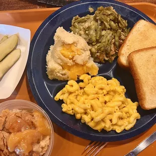 Veggie Plate (Mac and Cheese, Green Bean Casserole, Baked Potato Casserole, Peach Cobbler), Texas Toast, Side of Pickles