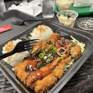 Chicken katsu with some sriracha.